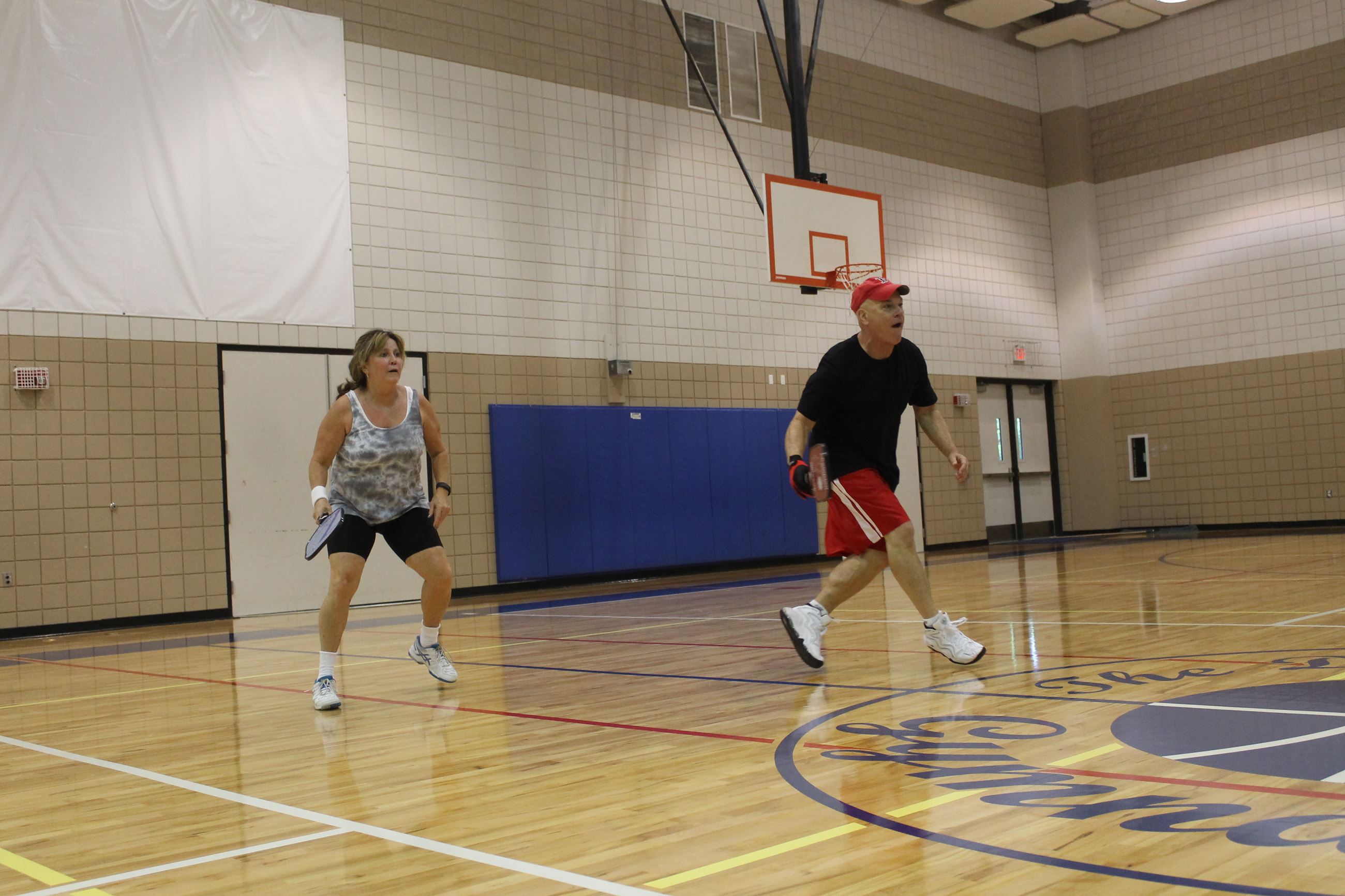 Two players playing pickleball