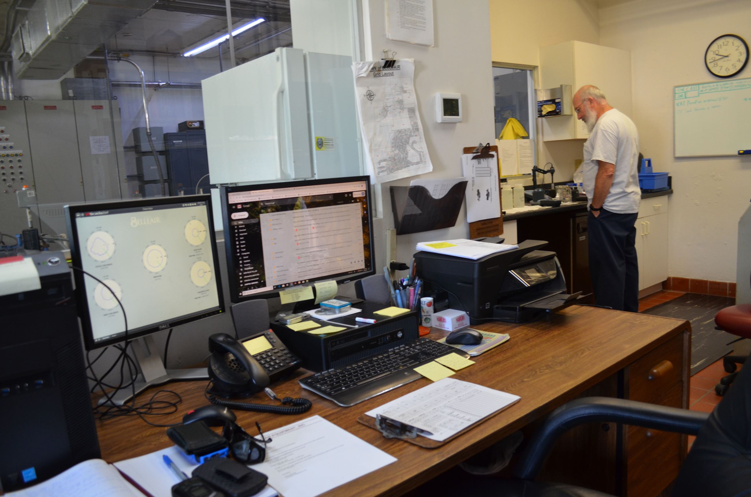 Desk with computers sitting on top, 