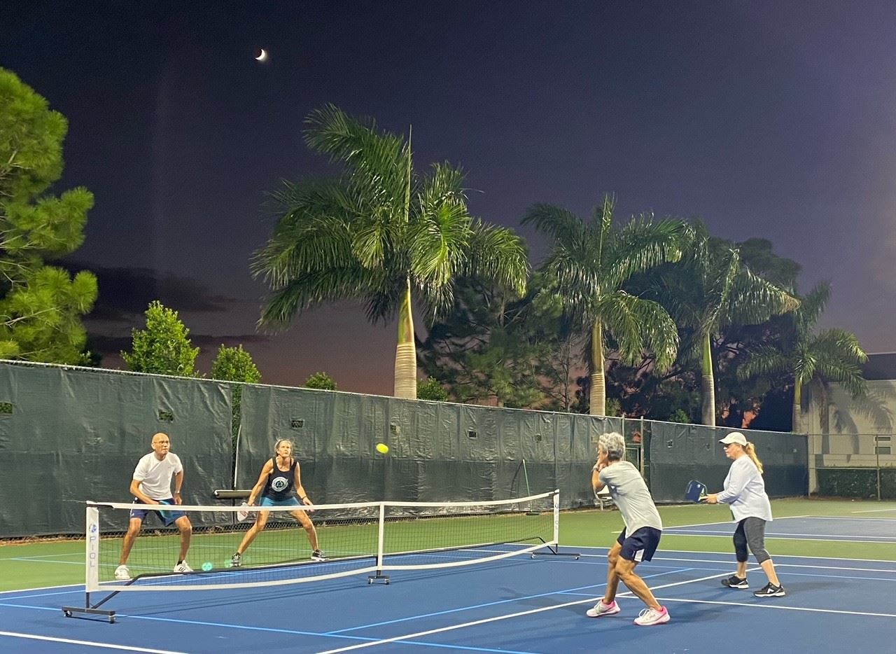 Belleair residents play pickleball on the outdoor courts 